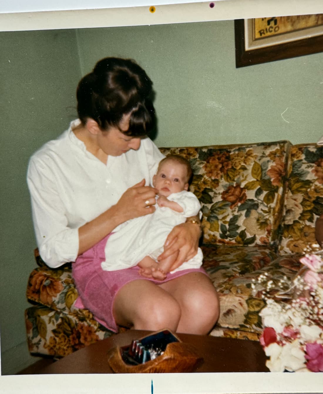 A vintage family photo: Kim as a baby in her mother’s arms
